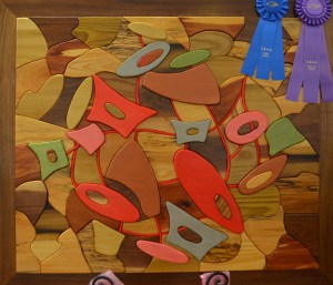 Best Of Show: Together Through Turmoil, wood inlay by Deborah Anderson